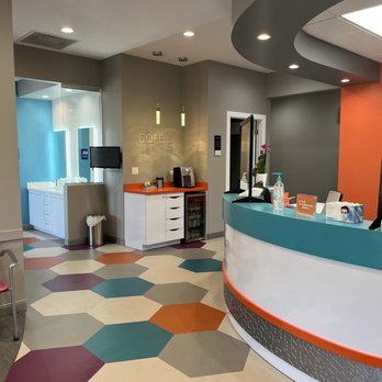 Orthodontic Specialists - Koufos & Assoc - Reception desk and welcome area. - Orthodontists Near Me - Munster, Indiana Orthodontic Specialists - Koufos & Assoc - Reception desk and welcome area. - Orthodontists Near Me - Munster, Indiana