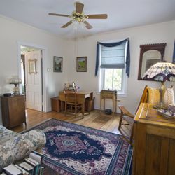 The Artist's Inn & Gallery - This is the puzzle room - a gathering spot for all guests....or make it your private suite when you add it to the Rose Room.