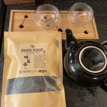 Taian Herbal Tea - a black tea pot and two glasses - Coffee & Tea Near Me - Chicago, Illinois Taian Herbal Tea - a black tea pot and two glasses - Coffee & Tea Near Me - Chicago, Illinois