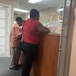 LaRoche Dental - Patients at the reception desk