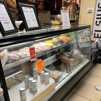 SF Deli & Wine - a display of food - Beer, Wine & Spirits Near Me - San Francisco, California SF Deli & Wine - a display of food - Beer, Wine & Spirits Near Me - San Francisco, California