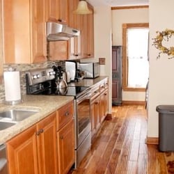Lovely 1st floor kitchen with granite counter tops, stainless steel appliances, laundry center and much more.