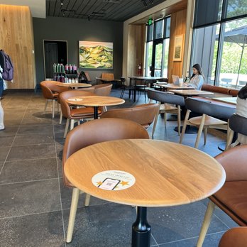 Starbucks - a coffee shop with tables and chairs - Coffee & Tea Near Me - Dublin, Ohio Starbucks - a coffee shop with tables and chairs - Coffee & Tea Near Me - Dublin, Ohio