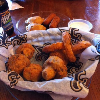 Ponchatoulas - Deconstructed app sampler. The onion rings are killer with some heat after. Meat pies are spicy good. - Cajun/Creole Near Me - Ruston, Louisiana