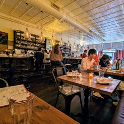 Mateo - Inside. View of dining room and bar from our table in the back. I'm facing towards the storefront.