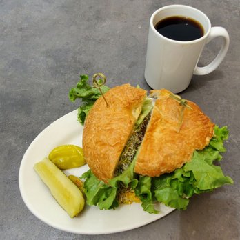 Pannikin Coffee & Tea - Indian Chicken Curry on Croissant with Coffee - Coffee & Tea Near Me - Encinitas, California Pannikin Coffee & Tea - Indian Chicken Curry on Croissant with Coffee - Coffee & Tea Near Me - Encinitas, California
