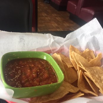 Hilda's Kitchen - Salsa is spicy to me. Not too bad that I can't eat it but it has a kick. Chips are thicker pretty good. - Cafes Near Me - Ennis, Texas