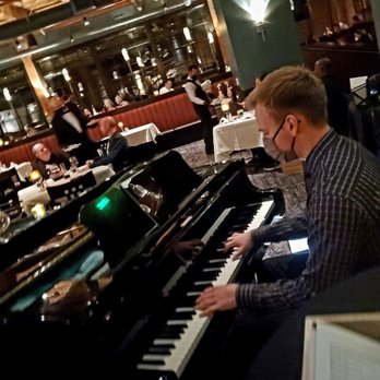 El Gaucho - My son rocking "Fly Me to the Moon" - Steakhouses Near Me - Seattle, Washington