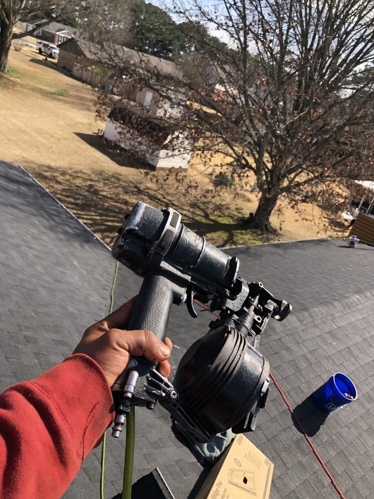 Slide of E & S Roofing