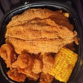 Krab Kingz - Shrimp and Catfish Platter. Fries are underneath the fish in this photo. You can also order whiting instead of the catfish. - Seafood Near Me - Atlanta, Georgia
