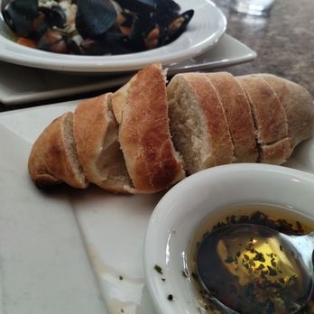 Massimo Italian Bar & Grill - Warm bread and clams/mussels in broth - Italian Near Me - Gig Harbor, Washington Massimo Italian Bar & Grill - Warm bread and clams/mussels in broth - Italian Near Me - Gig Harbor, Washington