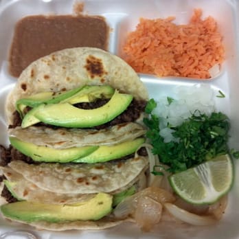 Dos Bros Tacos - 3 bistek (steak) tacos WITH avocado and rice and beans. Ordered to go. Very good! - Tacos Near Me - Garland, Texas Dos Bros Tacos - 3 bistek (steak) tacos WITH avocado and rice and beans. Ordered to go. Very good! - Tacos Near Me - Garland, Texas