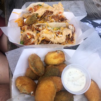 Jonesin - two baskets of food on a picnic table - Food Trucks Near Me