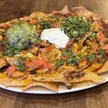 Yard House - Yard House Chicken Nachos - Bars Near Me - Coral Gables, Florida Yard House - Yard House Chicken Nachos - Bars Near Me - Coral Gables, Florida