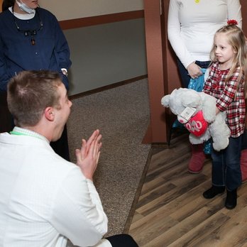 Sterling Dental - Dr Windom sharing lighter moments with his patient - General Dentistry Near Me - Sterling, Colorado Sterling Dental - Dr Windom sharing lighter moments with his patient - General Dentistry Near Me - Sterling, Colorado