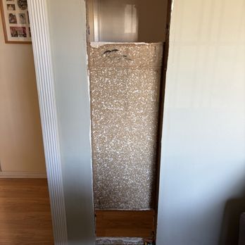 California Quality Drywall Services - hole after gas heater removed - Drywall Installation & Repair Near Me
