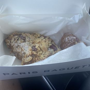 Paris Baguette - Raspberry & almond croissant dusted with powdered sugar - Bakeries Near Me - Carlsbad, California Paris Baguette - Raspberry & almond croissant dusted with powdered sugar - Bakeries Near Me - Carlsbad, California