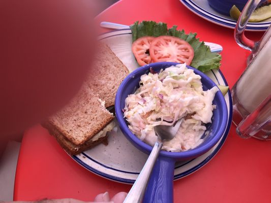 Photo of Wilson's Ice Cream Parlor - Ephraim, WI, US. Chicken sandwich with finger in view..