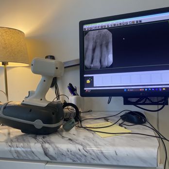 Susan M. Dennis, DDS - They use a little hand held device to take X-rays. - Cosmetic Dentists Near Me - Portage, Michigan Susan M. Dennis, DDS - They use a little hand held device to take X-rays. - Cosmetic Dentists Near Me - Portage, Michigan