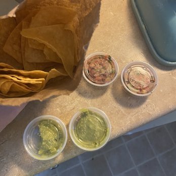 Ricos Tacos - Infamous $7 chips and guacamole. These are 1.5oz containers. Such a joke. - Mexican Near Me - Campbell, California Ricos Tacos - Infamous $7 chips and guacamole. These are 1.5oz containers. Such a joke. - Mexican Near Me - Campbell, California