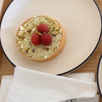 Café Blanc - Pistachio and raspberry tart - $9 - Cafes Near Me - Parma Heights, Ohio Café Blanc - Pistachio and raspberry tart - $9 - Cafes Near Me - Parma Heights, Ohio