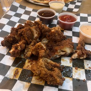 Solace Outpost - Chicken thighs - Bars Near Me - Falls Church, Virginia
