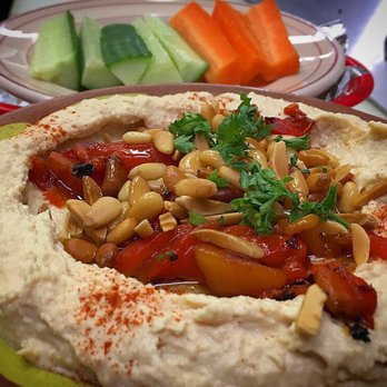 Sahara Restaurant - hummus topped with roasted red peppers, almonds& pinenuts. garnished with parsley. If you are gluten free they offer cucumbers and carrots! - Middle Eastern Near Me - Skillman, New Jersey Sahara Restaurant - hummus topped with roasted red peppers, almonds& pinenuts. garnished with parsley. If you are gluten free they offer cucumbers and carrots! - Middle Eastern Near Me - Skillman, New Jersey