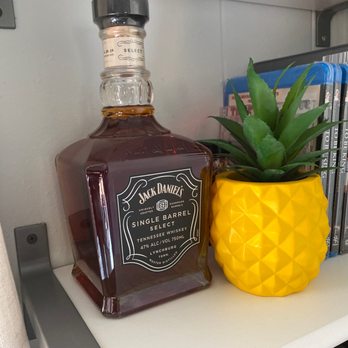 Metro Wine & Liquor - a bottle of jack daniels whiskey next to a pineapple plant - Beer, Wine & Spirits Near Me - Forest Hills, New York Metro Wine & Liquor - a bottle of jack daniels whiskey next to a pineapple plant - Beer, Wine & Spirits Near Me - Forest Hills, New York
