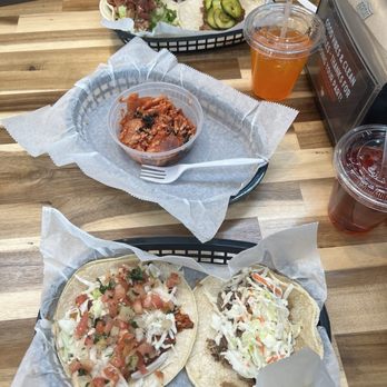 White Duck Taco Shop - Top plate: BLT crispy chicken & bangkok shrimp Bottom plate: Grilled fish & BBQ carnitas - Tacos Near Me - Chattanooga, Tennessee White Duck Taco Shop - Top plate: BLT crispy chicken & bangkok shrimp Bottom plate: Grilled fish & BBQ carnitas - Tacos Near Me - Chattanooga, Tennessee