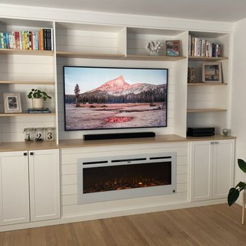 Conquering Clutter Closets & Cabinetry - Entertainment center with fireplace - Cabinetry Near Me