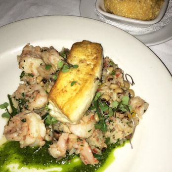 Peninsula Grill - Halibut w/shrimp & andouille sausage - New American Near Me - Charleston, South Carolina Peninsula Grill - Halibut w/shrimp & andouille sausage - New American Near Me - Charleston, South Carolina