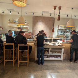 Tender Fire - As you walk, you see the pizza oven in the kitchen on your left.