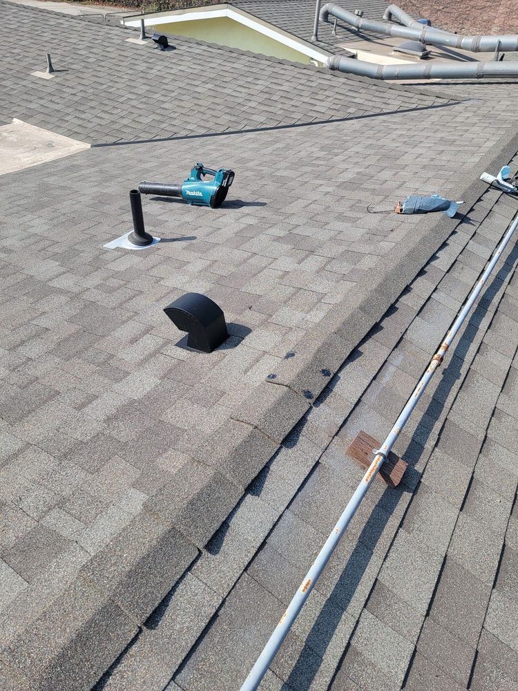 Slide of Over & Above Roofing