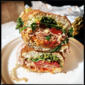 ALIDORO - Fratelli on whole wheat bread (porchetta, fresh mozzarella, sweet roasted peppers, arugula, lemon basil pesto, hot spread) - Sandwiches Near Me - New York, New York