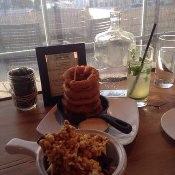 Engine Room - Bacon fat caramel popcorn and onion rings for happy hour! - Southern Near Me - Mystic, Connecticut