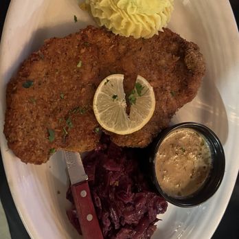 Aroma Restaurant - Tyrolean Schnitzel (pork) with inedible salty garlic mashed potatoes, the mushroom sauce for the schnitzel on the side. - Desserts Near Me - Ben Lomond, California