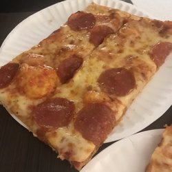 Southridge Golf Range & Larobi's Pizza - Slices from a 19" pepperoni pizza. So freaking good.