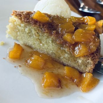 Pizzeria Mercato - Olive oil cake with peach compote - Pizza Near Me - Carrboro, North Carolina Pizzeria Mercato - Olive oil cake with peach compote - Pizza Near Me - Carrboro, North Carolina