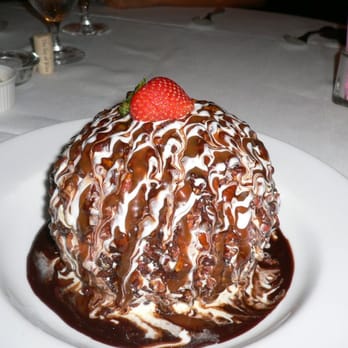 Cheever's Cafe - ice cream ball size of small child's head (vanilla ice cream, rolled in pecans, drizzled in chocolate, topped with strawberry) - New American Near Me - Oklahoma City, Oklahoma Cheever's Cafe - ice cream ball size of small child's head (vanilla ice cream, rolled in pecans, drizzled in chocolate, topped with strawberry) - New American Near Me - Oklahoma City, Oklahoma