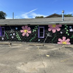 Floral Expressions By Darlene - Thank you to the Iroquois High School art students for creating this beautiful mural on our flower shop. They are very talented !!