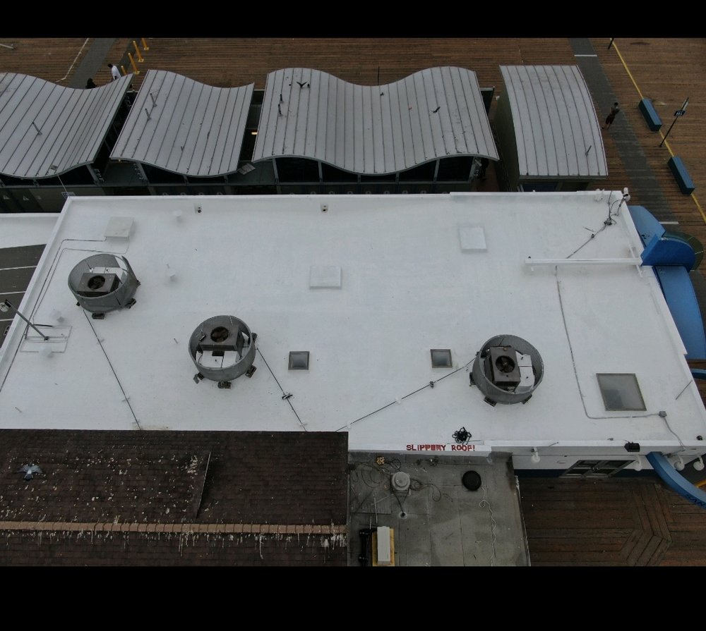 Slide of Maverick Roofing