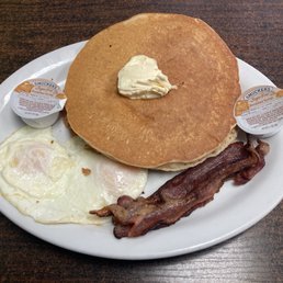 2 pancakes + 2 eggs + 2 bacon for $10.50 in January 2026. Two thumbs up! 2 pancakes + 2 eggs + 2 bacon for $10.50 in January 2026. Two thumbs up!