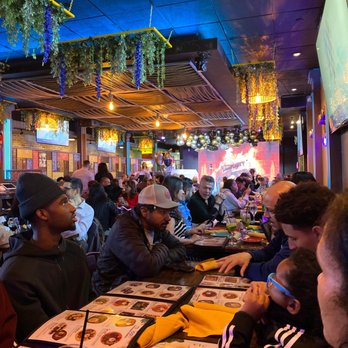 Sabor A Colombia - a group of people eating at a restaurant - Steakhouses Near Me - Levittown, New York Sabor A Colombia - a group of people eating at a restaurant - Steakhouses Near Me - Levittown, New York