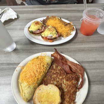 The Rusty Rooster - An amazing meaty meat lovers omelette and Eggs Benedict. - Breakfast & Brunch Near Me - Lake Ozark, Missouri The Rusty Rooster - An amazing meaty meat lovers omelette and Eggs Benedict. - Breakfast & Brunch Near Me - Lake Ozark, Missouri