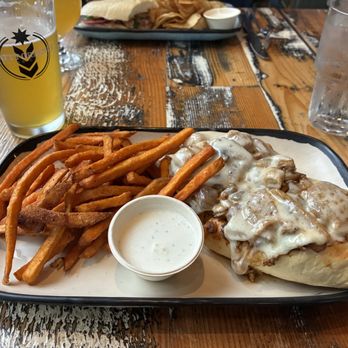 Natty Greene's Brewpub - chicken philly and sweet potato fries - Breweries Near Me - Greensboro, North Carolina Natty Greene's Brewpub - chicken philly and sweet potato fries - Breweries Near Me - Greensboro, North Carolina