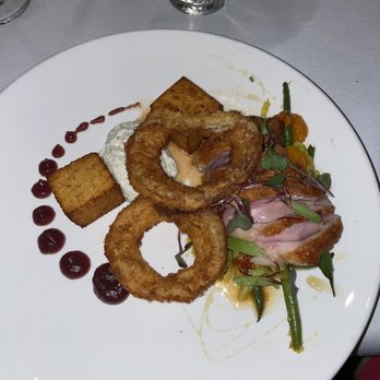 Parlor House Bistro - Duck breast. Those onion rings were fantastic and the duck was near perfect. Polenta was just okay. White creamy stuff was eh. - New American Near Me - Dunedin, Florida Parlor House Bistro - Duck breast. Those onion rings were fantastic and the duck was near perfect. Polenta was just okay. White creamy stuff was eh. - New American Near Me - Dunedin, Florida