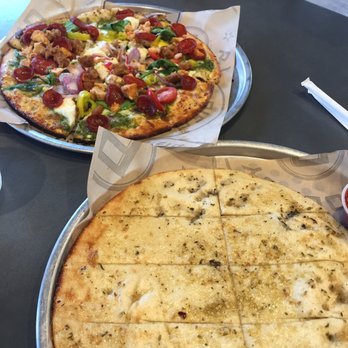 Pieology Pizzeria, Folsom - Custom pizza on pesto and herb butter and garlic sticks (: - Pizza Near Me - Folsom, California Pieology Pizzeria, Folsom - Custom pizza on pesto and herb butter and garlic sticks (: - Pizza Near Me - Folsom, California