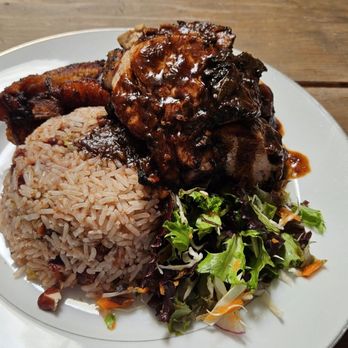 Mintos jamaican Restaurant & bar - Smoked Jamaican Jerk Chicken with Plantain and Rice & Beans. Delicious! - Caribbean Near Me - Oakland, California Mintos jamaican Restaurant & bar - Smoked Jamaican Jerk Chicken with Plantain and Rice & Beans. Delicious! - Caribbean Near Me - Oakland, California