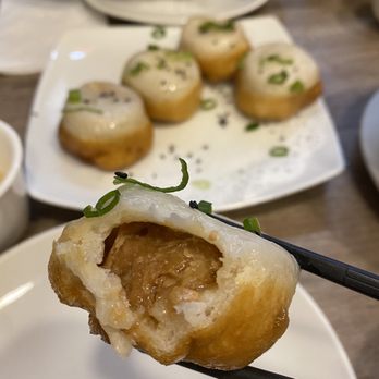 Dumpling Kitchen - A5. Shanghai-Style Pan-Fried Pork Buns (6) - Chinese Near Me - San Francisco, California Dumpling Kitchen - A5. Shanghai-Style Pan-Fried Pork Buns (6) - Chinese Near Me - San Francisco, California