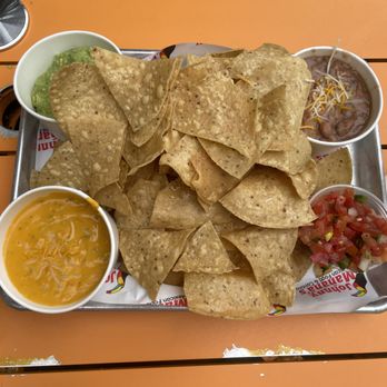 Johnny Mañana's - Chips n dips-- comes with a good variety of dips and a great amount of chips. - Mexican Near Me - Oceanside, California Johnny Mañana's - Chips n dips-- comes with a good variety of dips and a great amount of chips. - Mexican Near Me - Oceanside, California